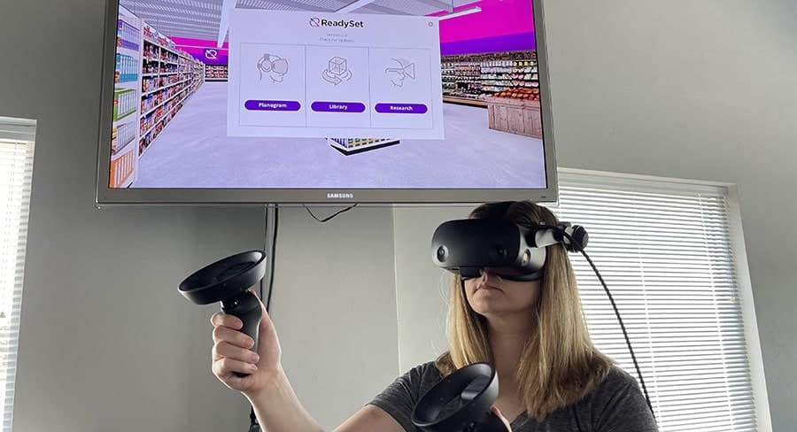 Woman in HP Reverb VR headset using ReadySet retail software