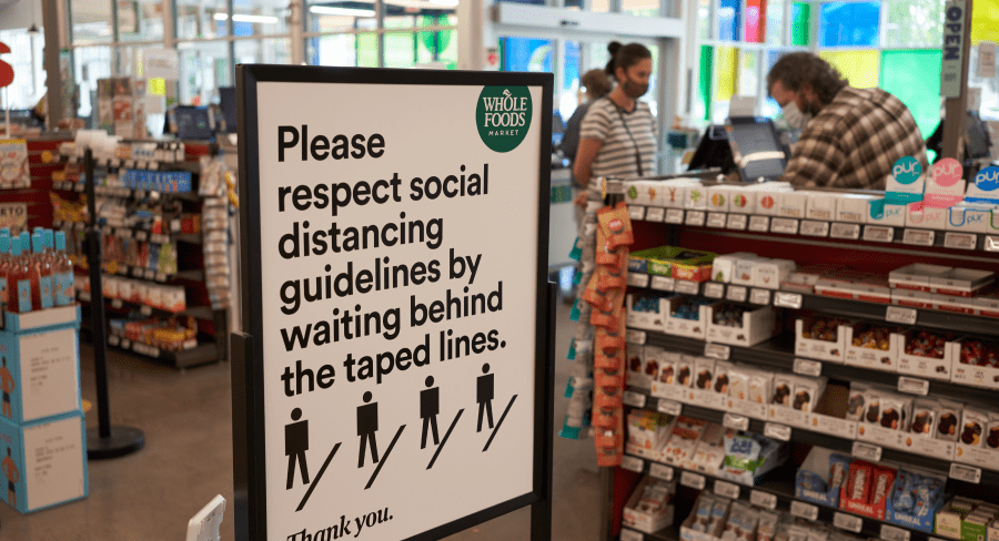 Please social distance sign at checkout area due to COVID-19 pandemic