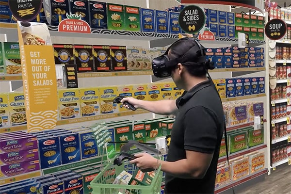 Man shopping for pasta in virtual reality grocery aisle