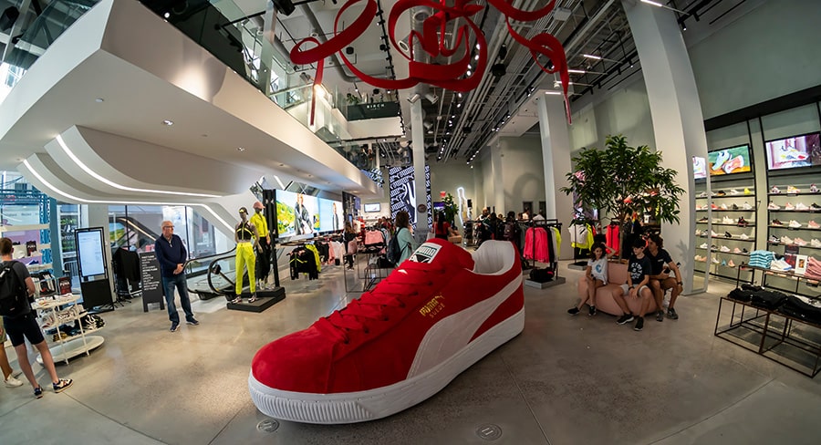 Giant shoe and vibrant displays in puma flagship store