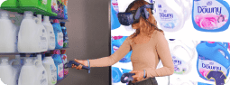 Retail employee using VR training to merchandise a shelf