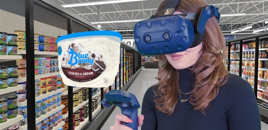 ReadySet virtual reality Walmart ice cream aisle with female shopper in VR headset holding up and looking at a 3D model of Blue Bunny Cookies & Cream treat