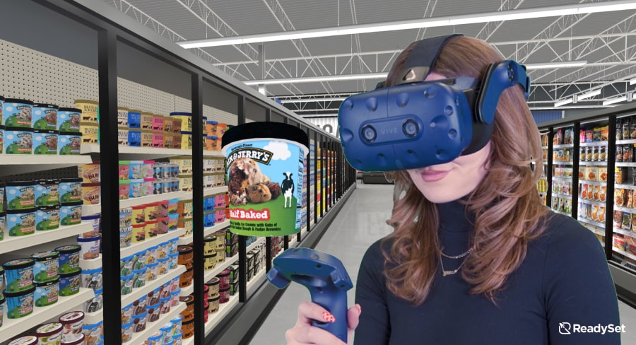 ReadySet virtual reality Walmart ice cream aisle with female shopper in VR headset during research study holding up and looking at a 3D model of Ben & Jerry's Half Baked 